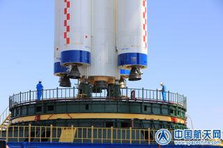 A Chinese Long March 2F rocket rolls out to its launch pad at the Jiuquan Satellite Launch Center in northwest China to launch the Tiangong-2 space laboratory.