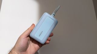 Anker Battery Pack in hand, 10,000mAh blue
