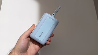 Anker Battery Pack in hand, 10,000mAh blue