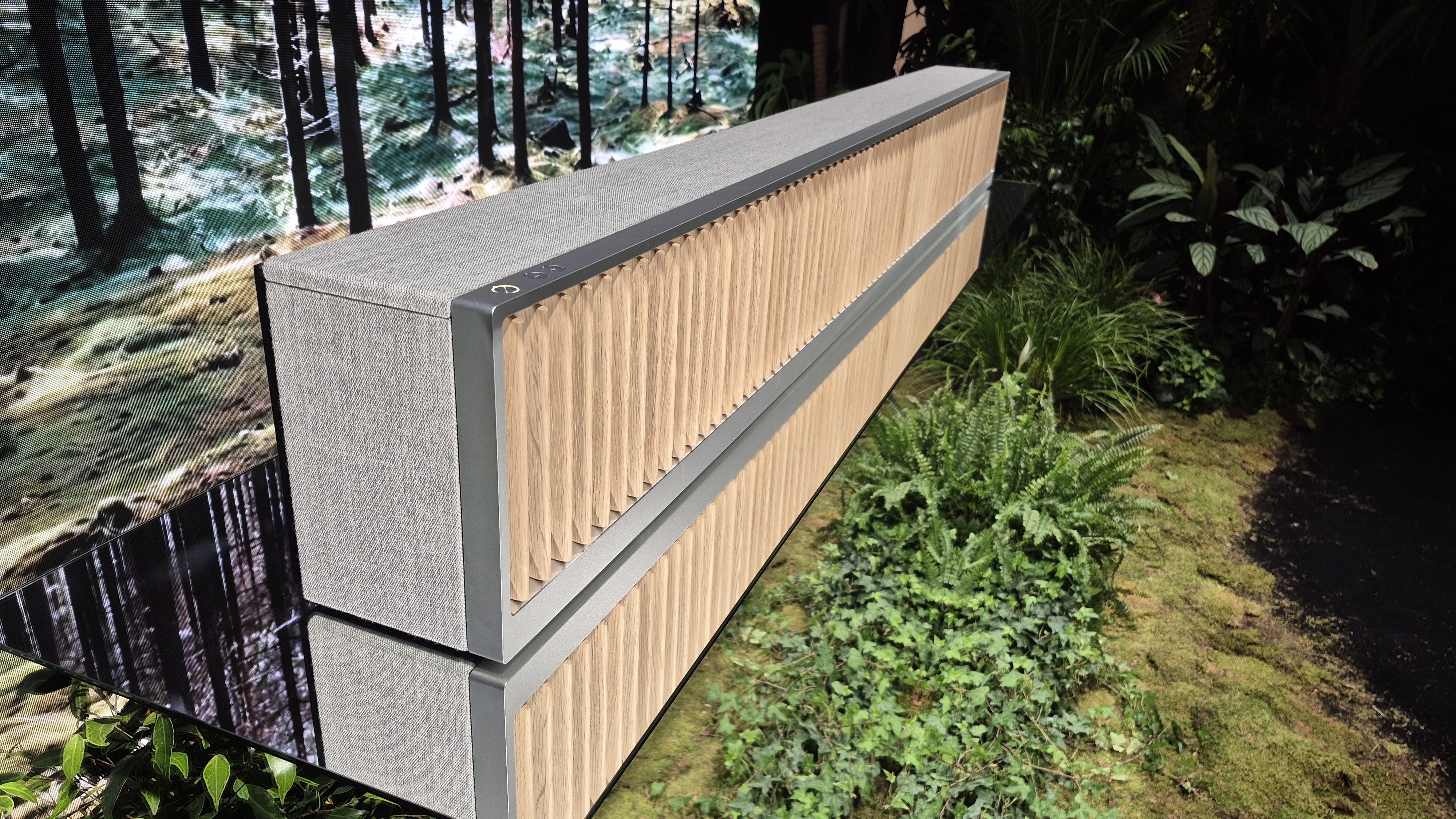 Side profile of the Dynaudio Opus One in forest showroom