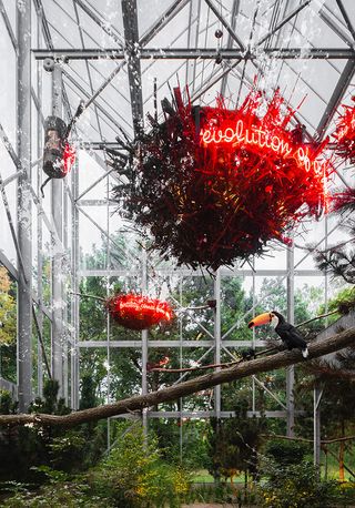 The greenhouse at Labiomista with several large, red installations
