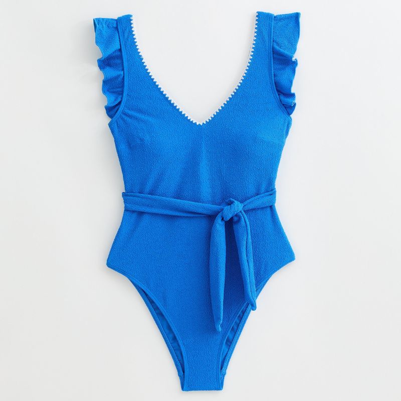 A cutout of a blue frill swimsuit with belt from New Look