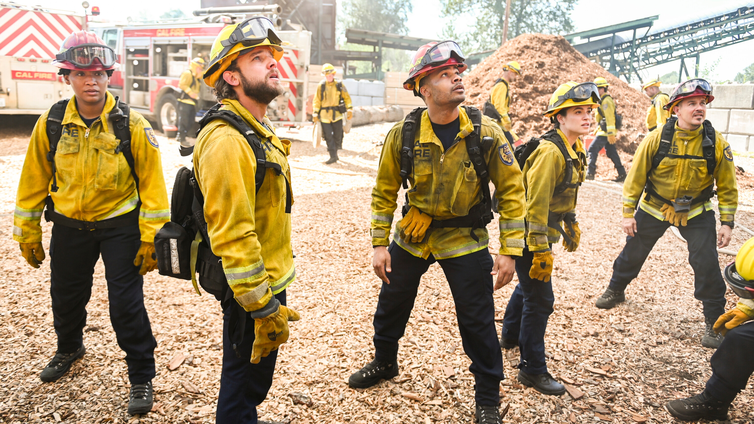 Bode Donovan (Max Thieriot) and a team of firefighters tend to an emergency.