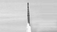 A Thor-Agena rocket launches the classified Discoverer 26 satellite on a secret mission for the U.S. Air Force on July 7, 1961.