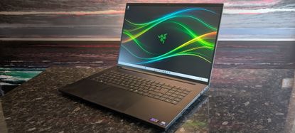 The Razer Blade 18 (2026) pictured on a black marble worktop.