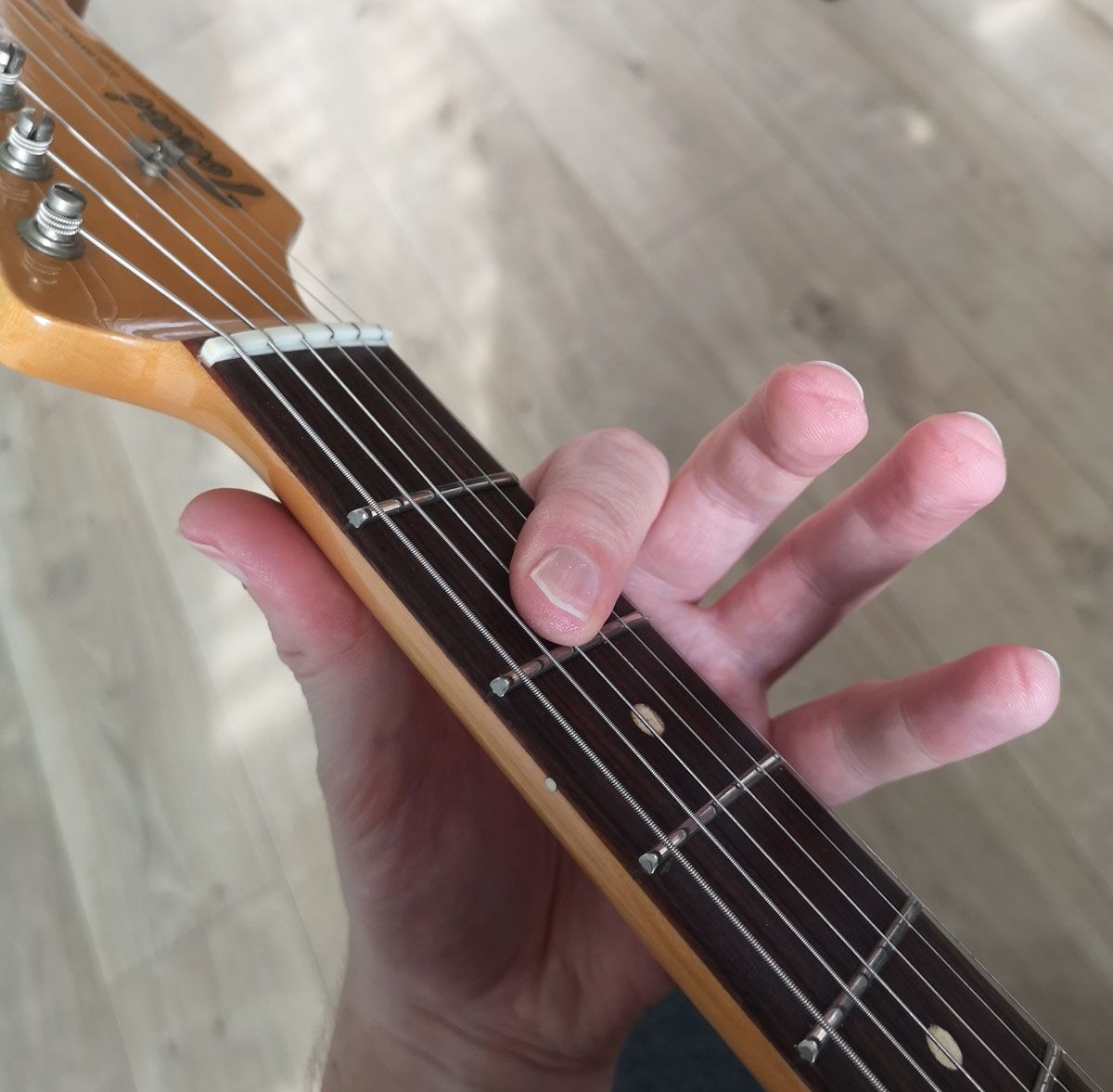 How to play an A chord on guitar: open A