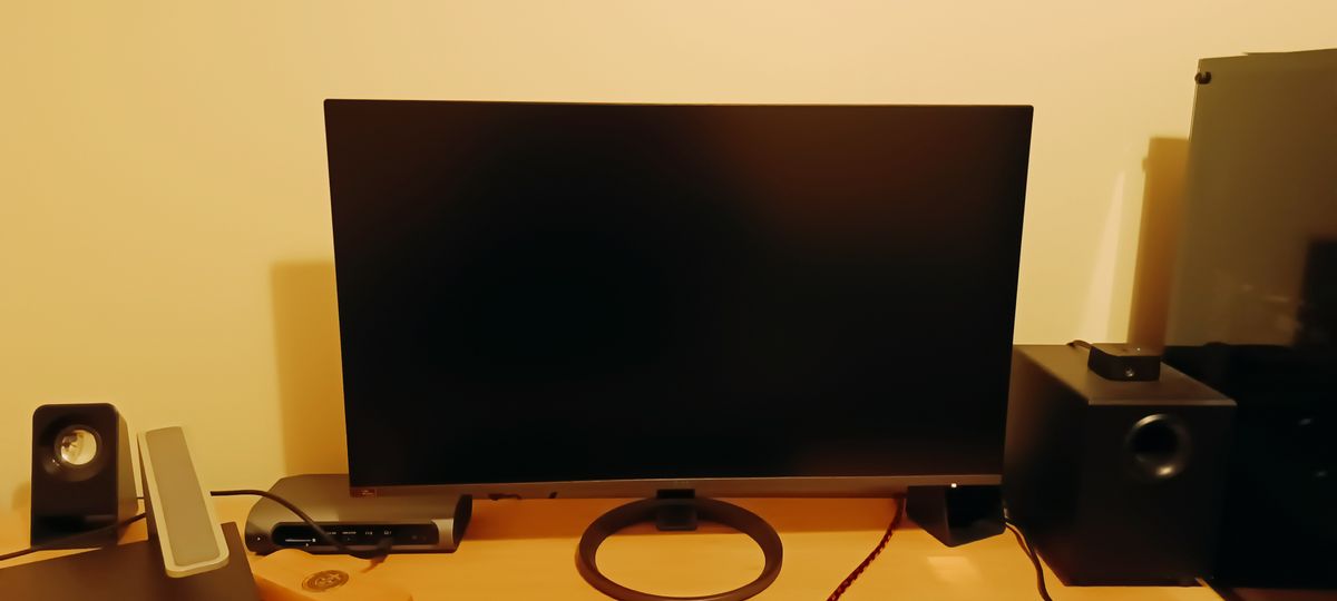 A black 27-inch Acer Vero RL272 monitor sitting on a wooden desk