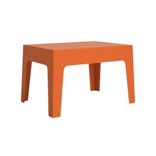 An orange outdoor coffee table