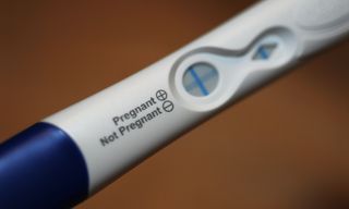 A positive pregnancy test.