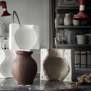 industrial vase and red clay moulds
