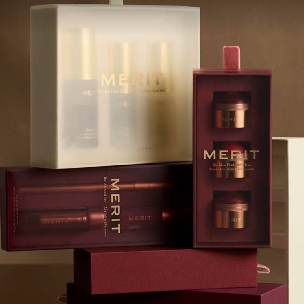 A variety of MERIT Beauty products stacked on top of each other. 