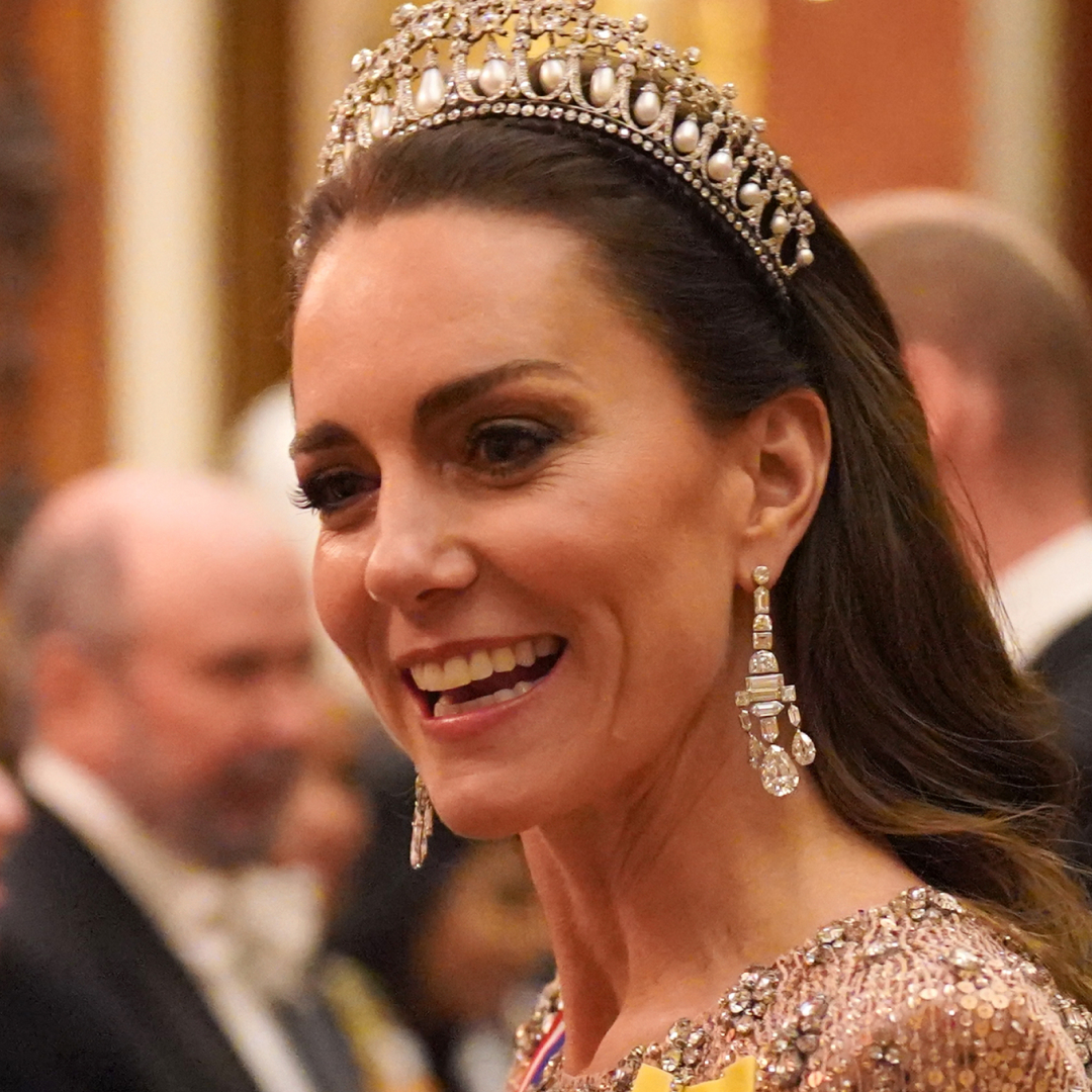 Kate Middleton wearing a tiara and a pink sequined gown 