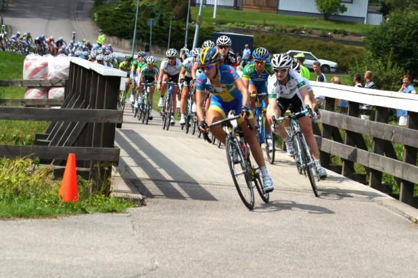 Swedish Champion Emma Johansson (Hitec Products) leads over the (usually) pedestrian bridge in Vargarda.