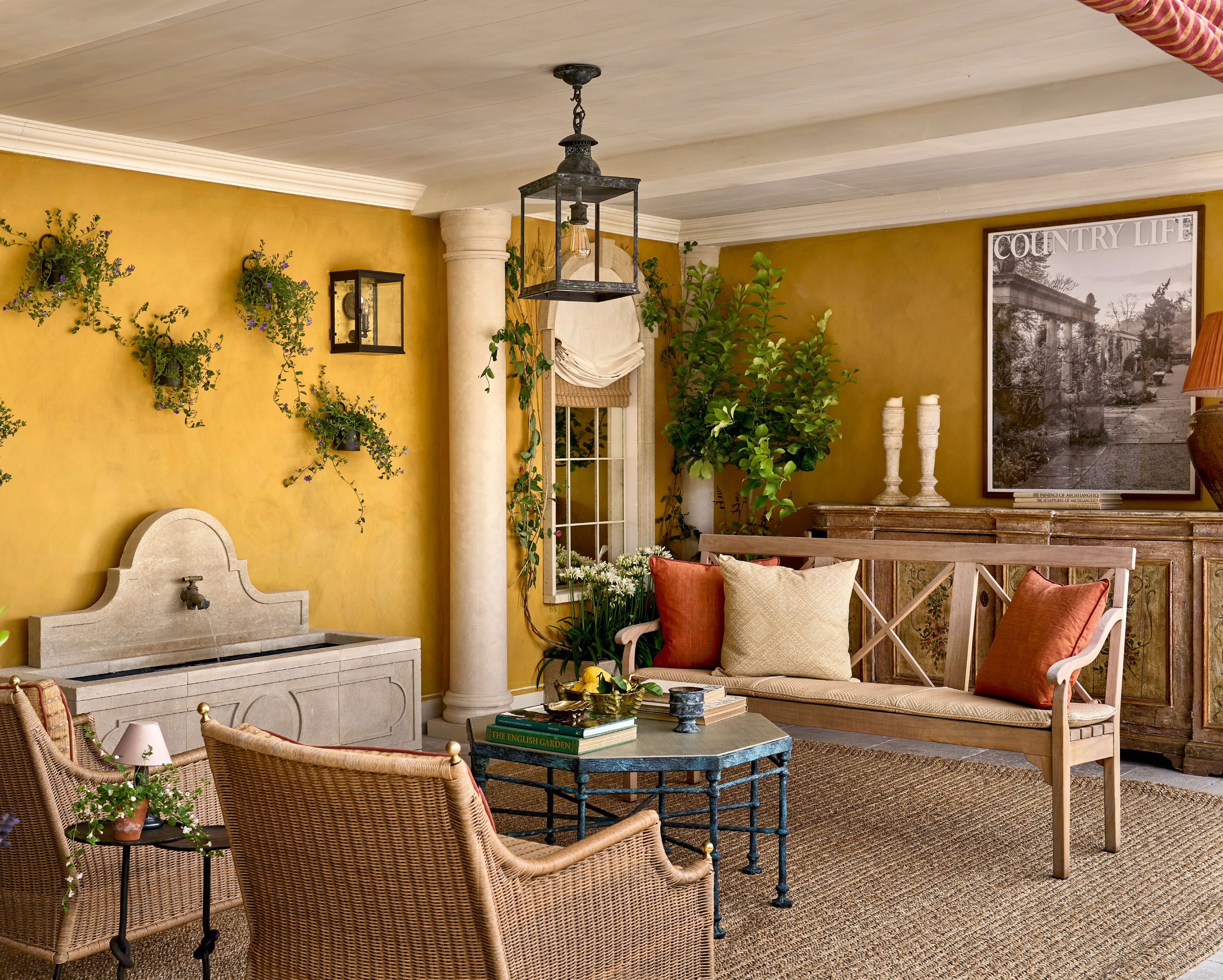 The ‘outdoor drawing room’ was furnished with chairs from Munder Skiles, an octagonal table from Chelsea Textiles and an antique credenza from Brownrigg