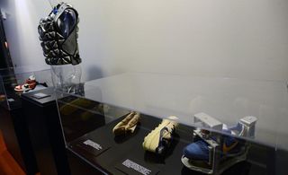 Nike shoes on display in glass boxes