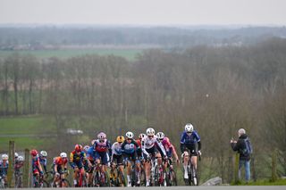 DRIJBER NETHERLANDS MARCH 10 A general view of Pfeiffer Georgi of The United Kingdom and Team dsmfirmenich PostNL and Puck Pieterse of The Netherlands and Team FenixDeceuninck lead the peloton during the 17th Miron Womens WorldTour Ronde van Drenthe 2024 a 1581km one day race from Beilen to Drijber UCIWWT on March 10 2024 in Drijber Netherlands Photo by Luc ClaessenGetty Images