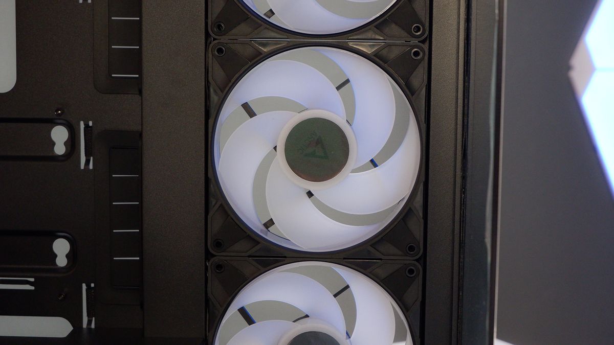 Arctic's Xtender PC case on a white desk with various parts being installed to build a functional gaming PC.