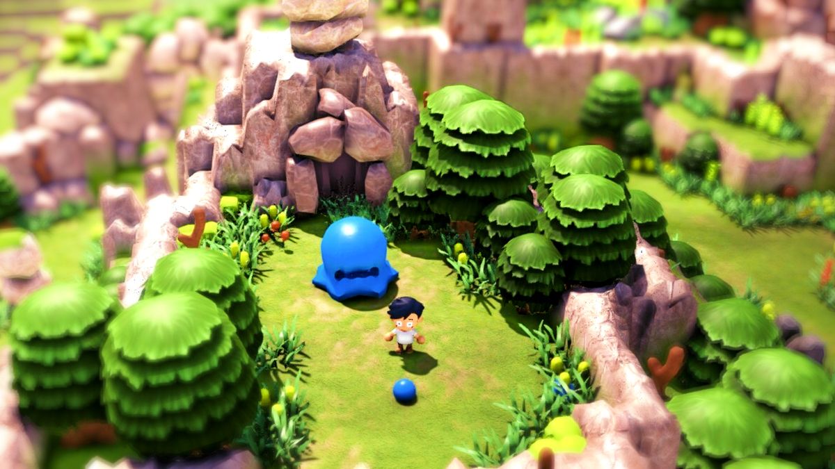 Littlelands screenshot showing a small boy atop a colorful grassy hill standing in front of a massive blue slime creature