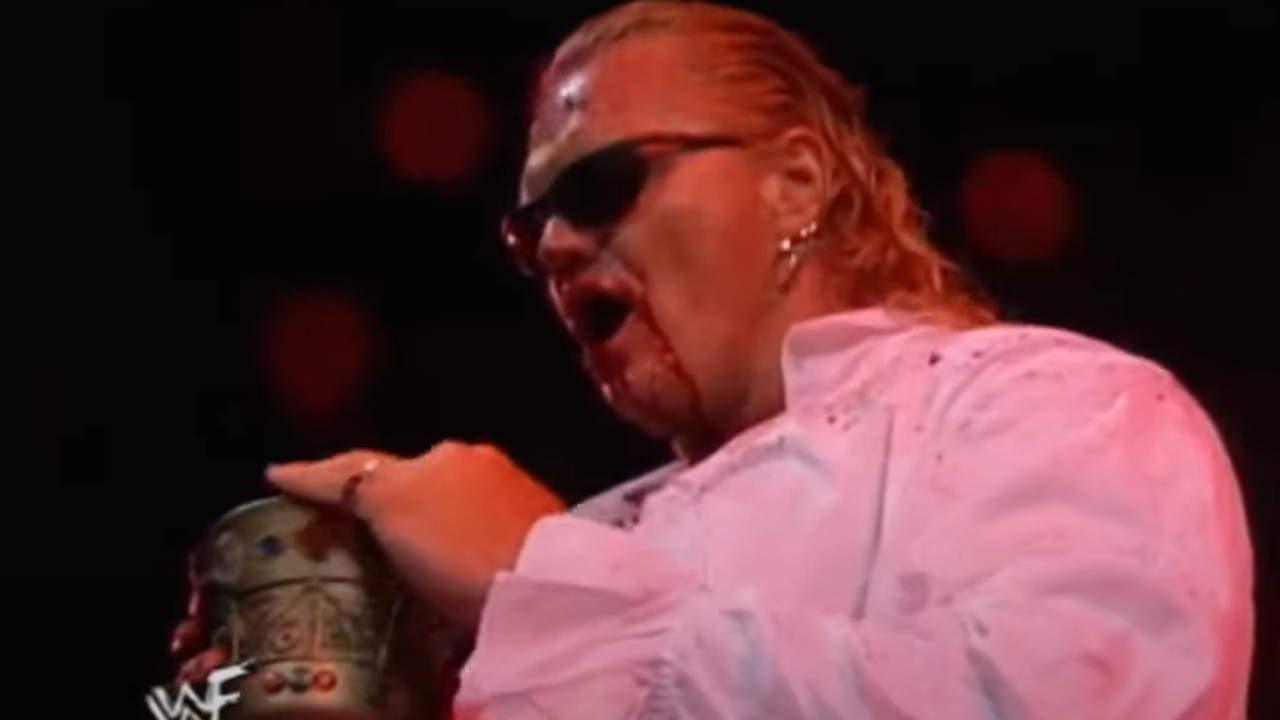 Gangrel drinks from a chalice with a white shirt on.