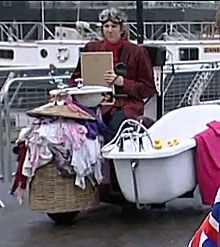 Edd China riding the "Bog Standard," the previous "fastest toilet" record holder.