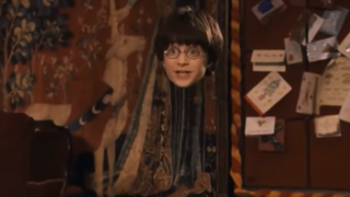 Harry using the Invisibility Cloak in Harry Potter and the Sorcerer's Stone.