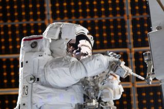 NASA astronaut Jessica Meir conducts a spacewalk swapping out batteries on the International Space Station alongside fellow astronaut Christina Koch. 