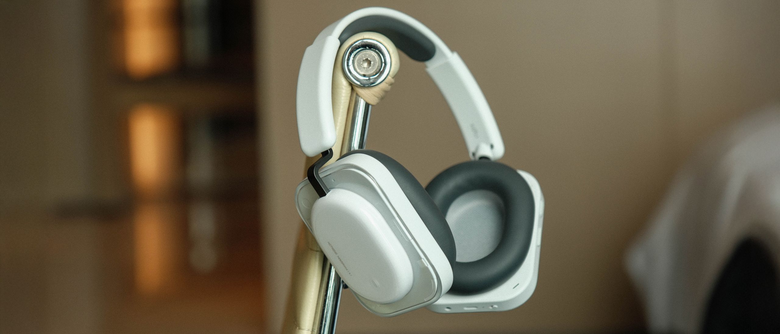 Nothing Headphone (a) offers a stylish design