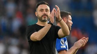Brighton's Italian head coach Roberto De Zerbi celebrates at the end of the English Premier League football match between Brighton and Hove Albion and Newcastle United at the American Express Community Stadium in Brighton, southern England on September 2, 2023.