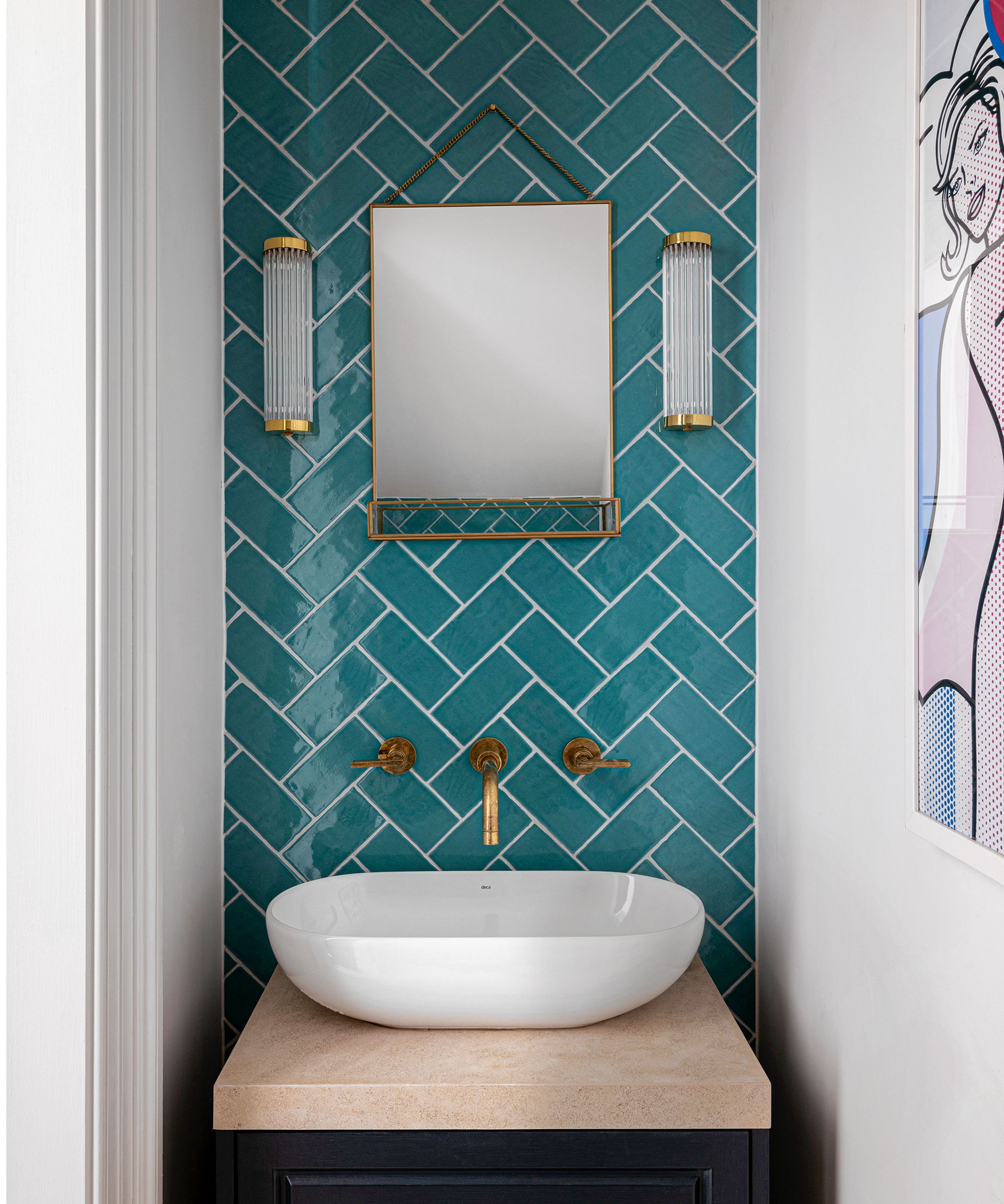 Small vanity with basin, mirror and wall lights