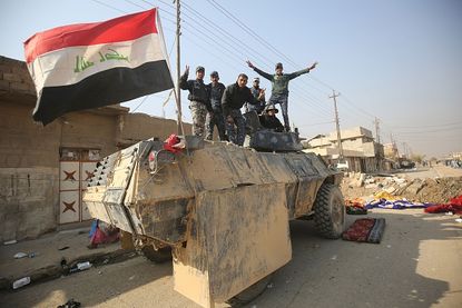 Iraqi forces in Hamam al-Alil, Iraq.