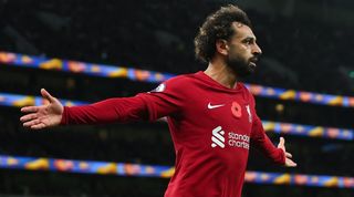 Mohamed Salah celebrates after scoring for Liverpool against Tottenham.