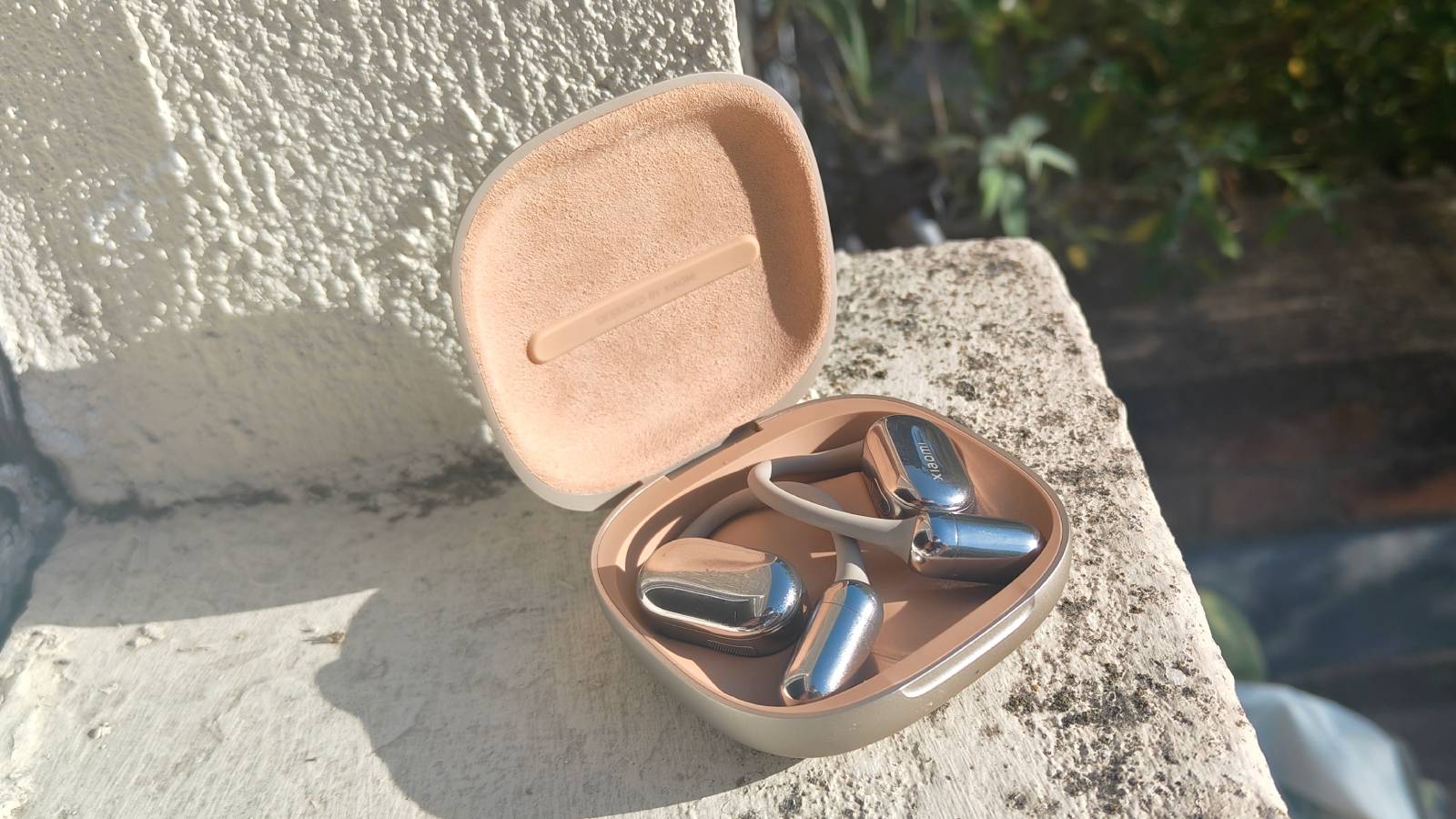 The Xiaomi OpenWear Stereo Pro in a sunny outdoor setting.
