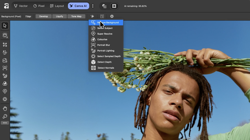 A close-up screenshot of a photo editing program interface showing a young man holding a bundle of white flowers above his head against a blue sky, with a drop-down menu for Canva AI features, including Remove Background, open at the top.
