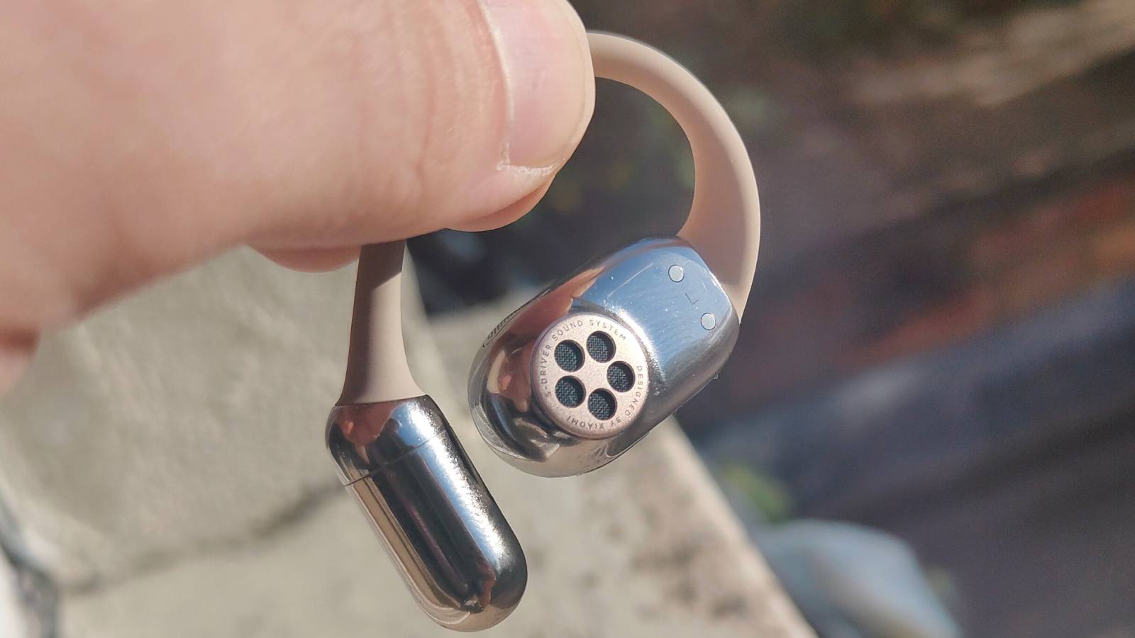 The Xiaomi OpenWear Stereo Pro in a sunny outdoor setting.