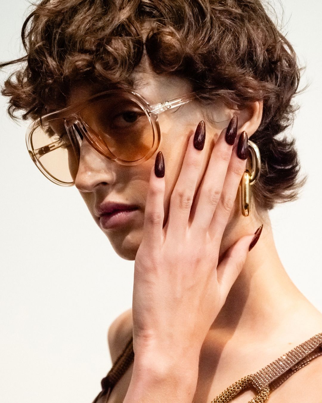 An image of the brown metallic nails backstage at Bronx and Banco spring/summer 26.