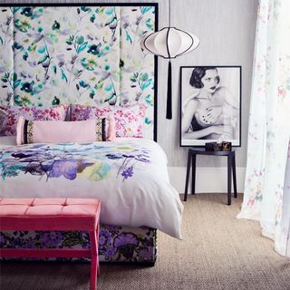 floral bedroom with artwork