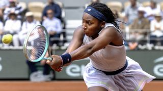 Coco Gauff hits a backhand return at French Open 2024