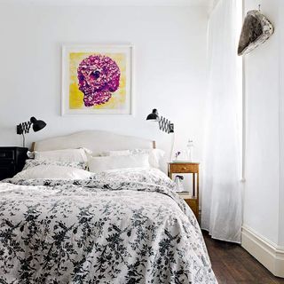 bedroom with skull print and coco bed