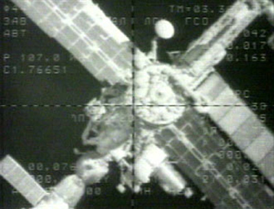 ISS Commander Manually Docks Cargo Ship at Space Station