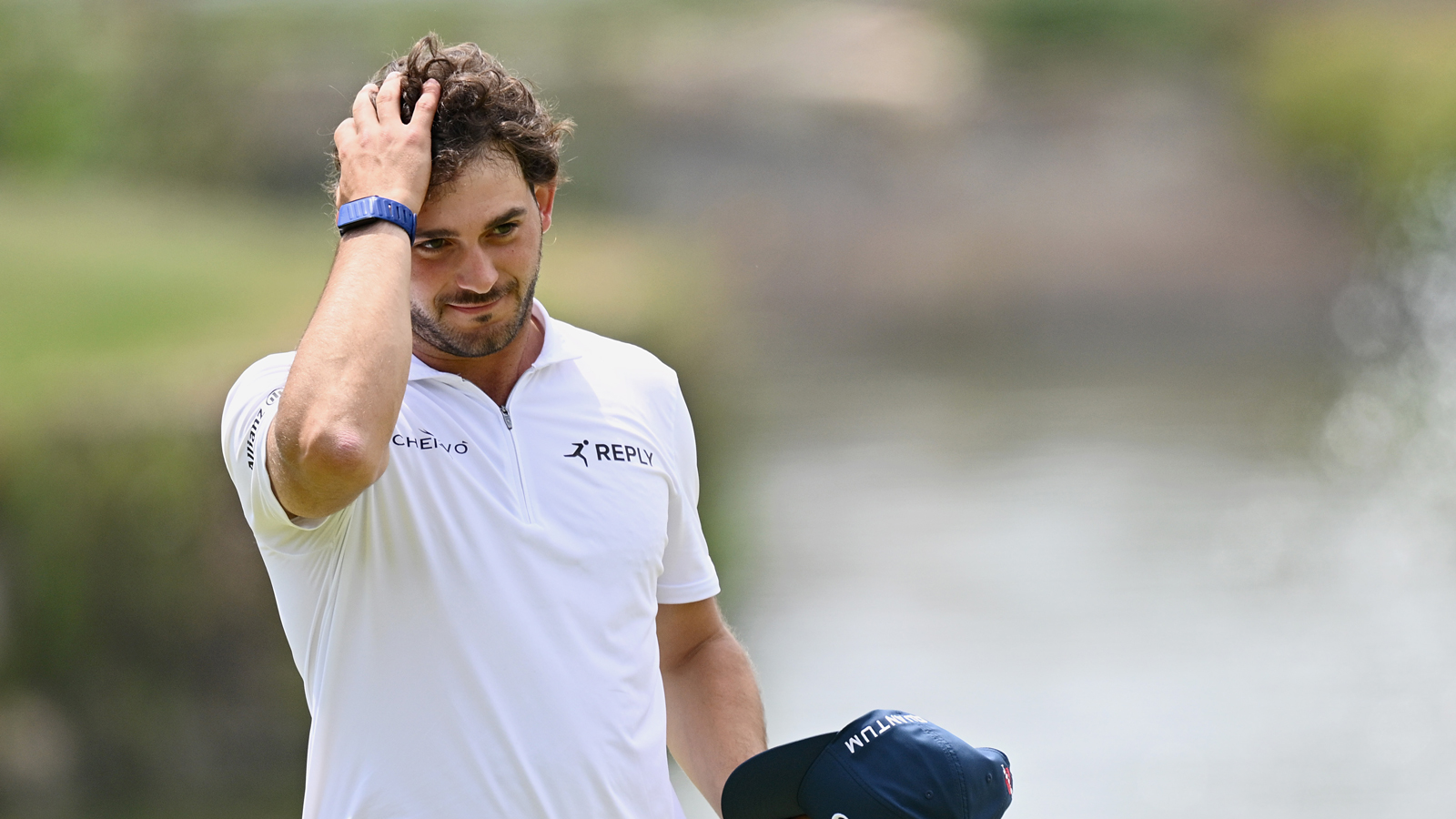 Gregorio de Leo runs his hand through his hair
