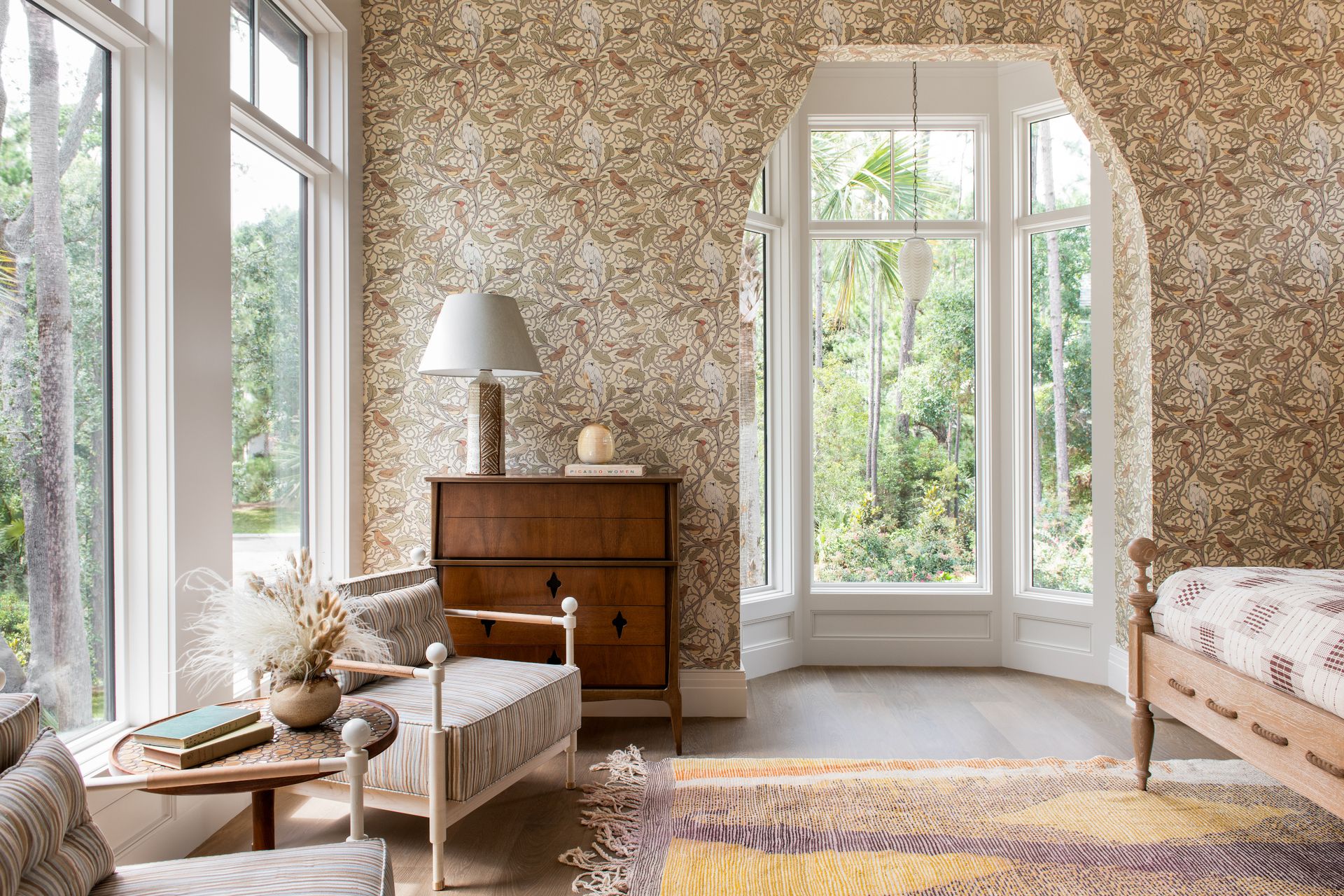 Bedroom styling with lighting and made bed