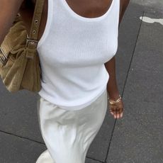 An image of @sylviemus_ wearing a slip skirt outfit.