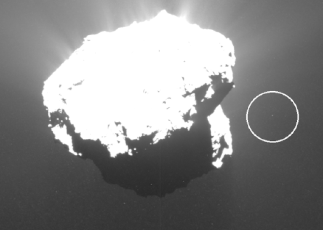 A chunk of debris (circled) can be seen orbiting Comet 67P/Churyumov-Gerasimenko in this animated GIF, which is composed of photos taken by Europe’s Rosetta spacecraft in October 2015. Spanish astrophotographer Jacint Roger noticed the object in 2019, after going through Rosetta archival photos.