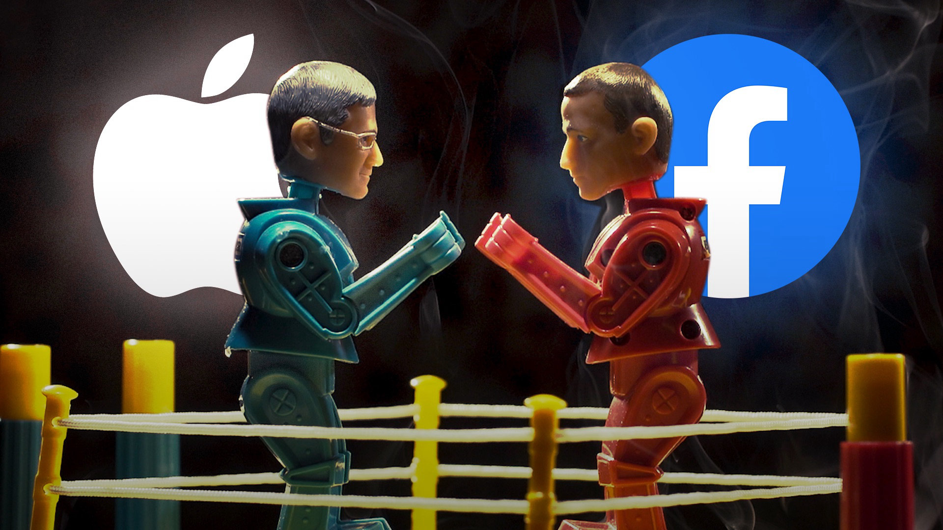 CEO Apple Tim Cook dan CEO Meta Mark Zuckerberg berhadapan sebagai robot Rock'em Sock'em.