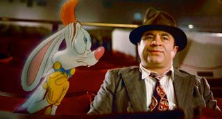 Who Framed Roger Rabbit Roger sitting next to Eddie as they hide out at the movies