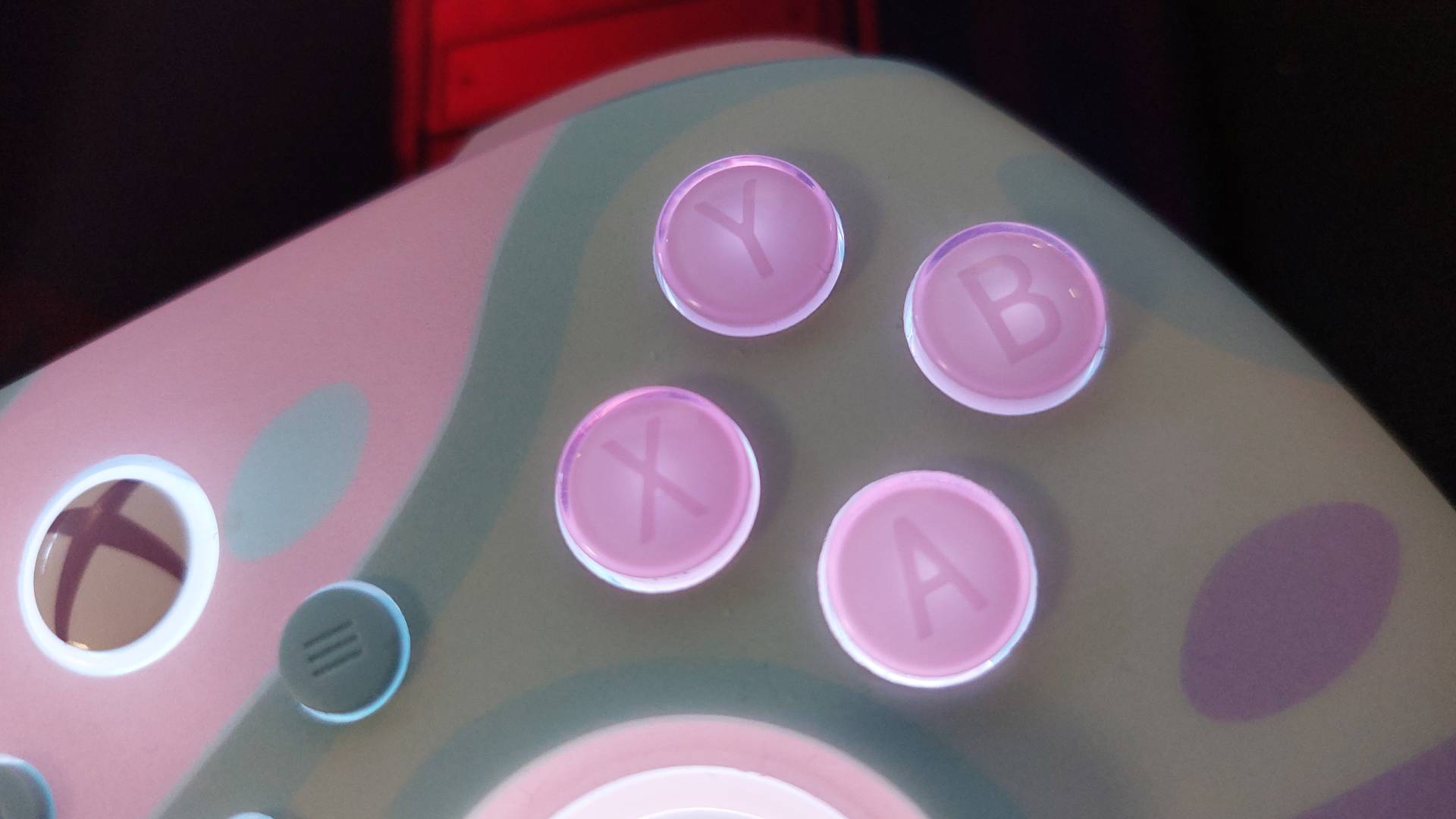 The GameSir T7 Pro Sugar Whirl Wireless Controller seen from various angles.