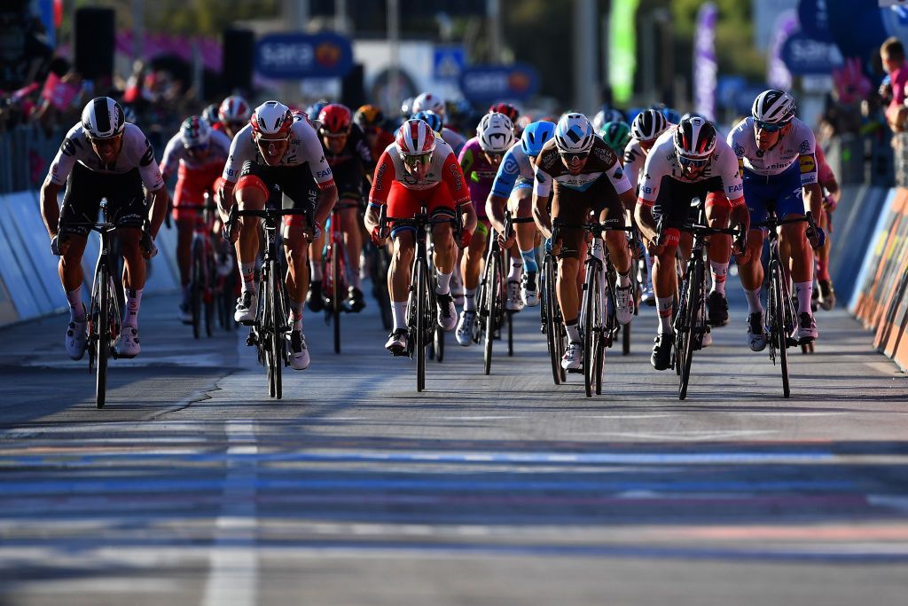 VIESTE ITALY OCTOBER 10 Arrival Sprint Michael Matthews of Australia and Team Sunweb Mikkel Bjerg of Denmark and UAE Team Emirates Elia Viviani of Italy and Team Cofidis Solutions Credits Andrea Vendrame of Italy and Team Ag2R La Mondiale Fernando Gaviria Rendon of Colombia and UAE Team Emirates Davide Ballerini of Italy and Team Deceuninck QuickStep Peloton during the 103rd Giro dItalia 2020 Stage Eight a 200km stage from Giovinazzo to ViesteGargano girodiitalia Giro on October 10 2020 in Vieste Italy Photo by Stuart FranklinGetty Images