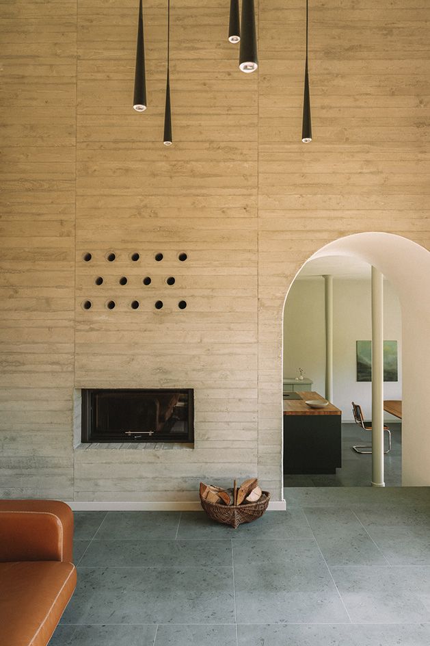 interior with raw concrete at Duplex by Atelier ST