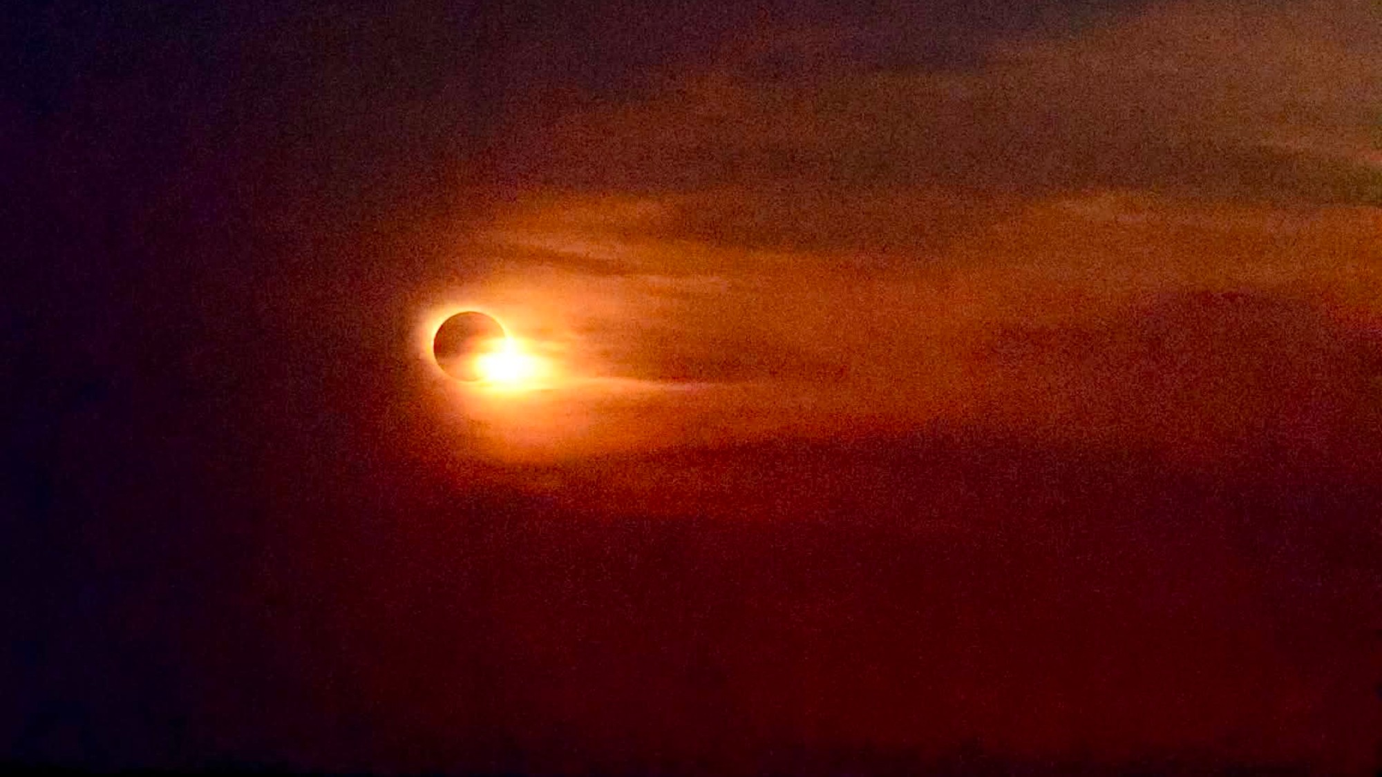 A weather satellite 22,000 miles above Earth saved my 2026 total solar eclipse cruise on the Mediterranean Sea 5 MyCelestialApp people sit on the deck of a ship wearing paper sunglasses, looking skyward