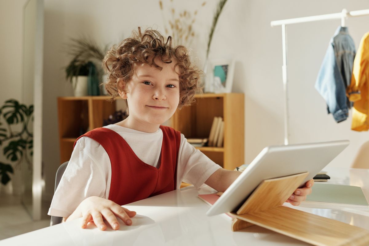 A child using an iPad.